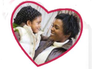 lady with child in heart shape