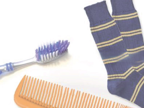 toothbrush, socks and comb