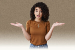 So what. Confused worried young dark curly hair woman shrugging hands spread sideways raise eyebrows confused express full disbelief clueless look perplexed arguing unable understant what happened.